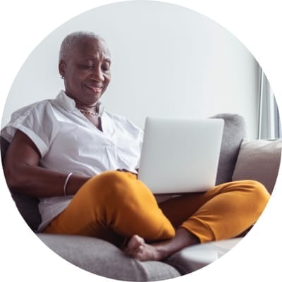 Woman looking at her laptop